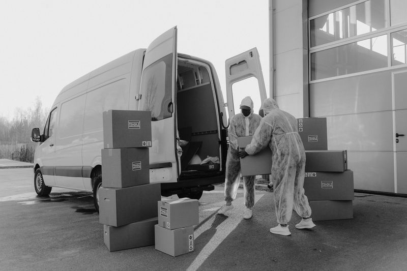 T&H Logistics crew loading items during a property cleanout
